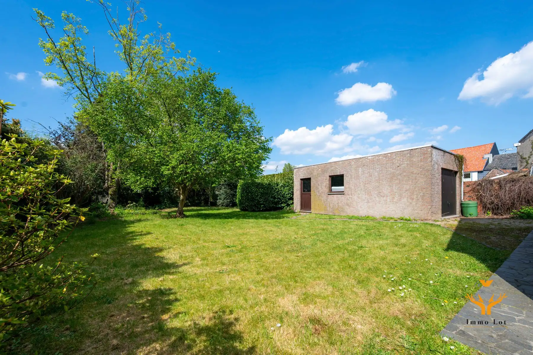 Gezinswoning met 5 slaapkamers en ruime tuin foto 24