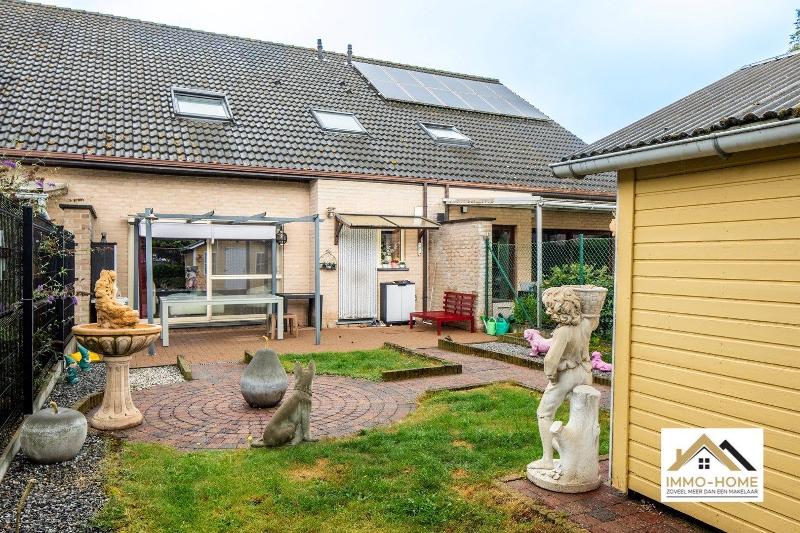 Verzorgde rijwoning in rustige wijk te Oostakker! foto 11