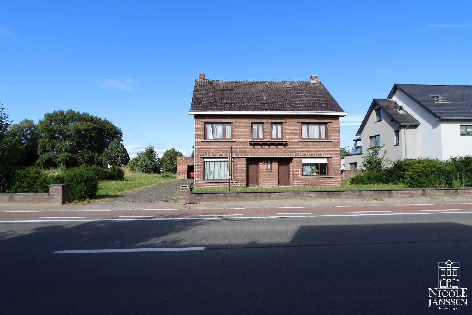 Ruime gezinswoning met dubbele garage in het centrum van Molenbeersel foto 22