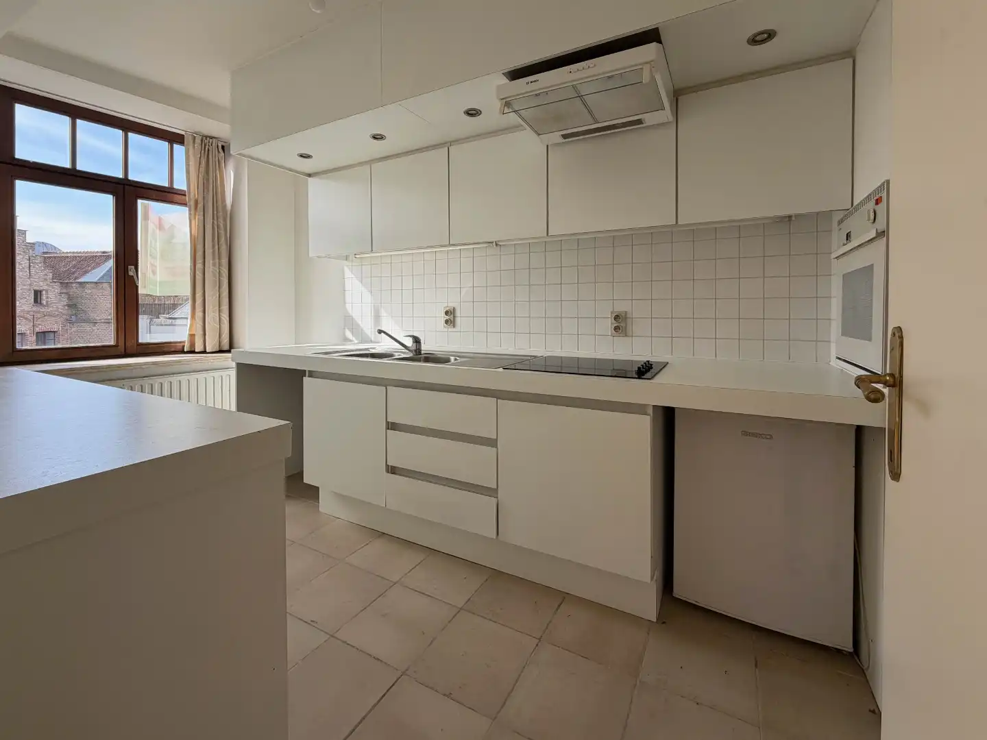 centraal gelegen appartement met prachtig zicht op de Halletoren foto 9