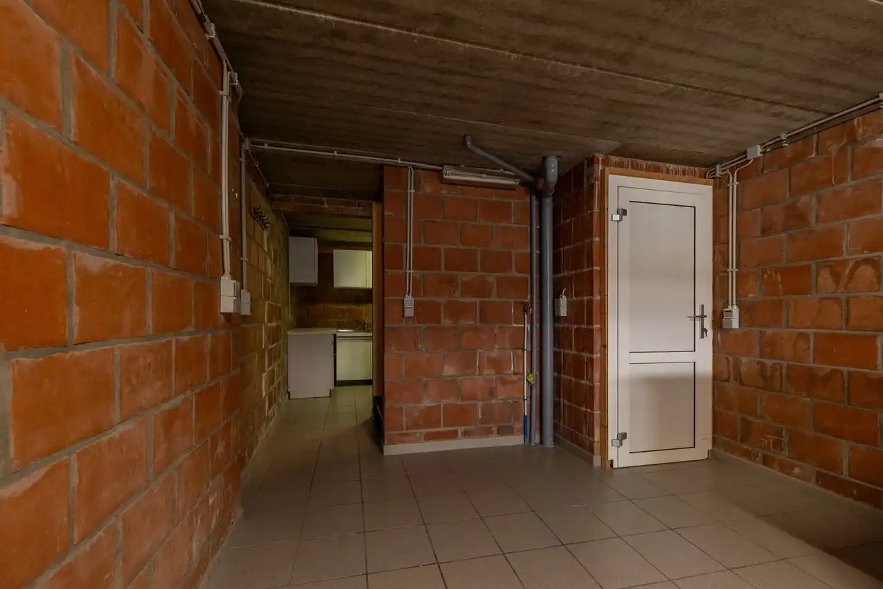 Verzorgde stadswoning met inpandige garage foto 3