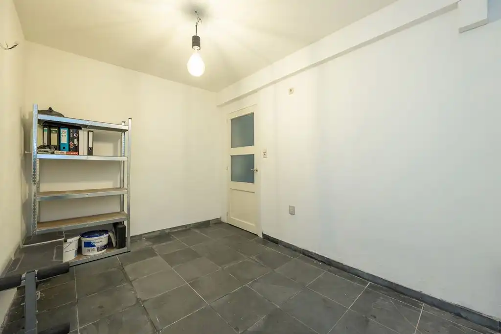 Karaktervol appartement met stadskoer foto 10