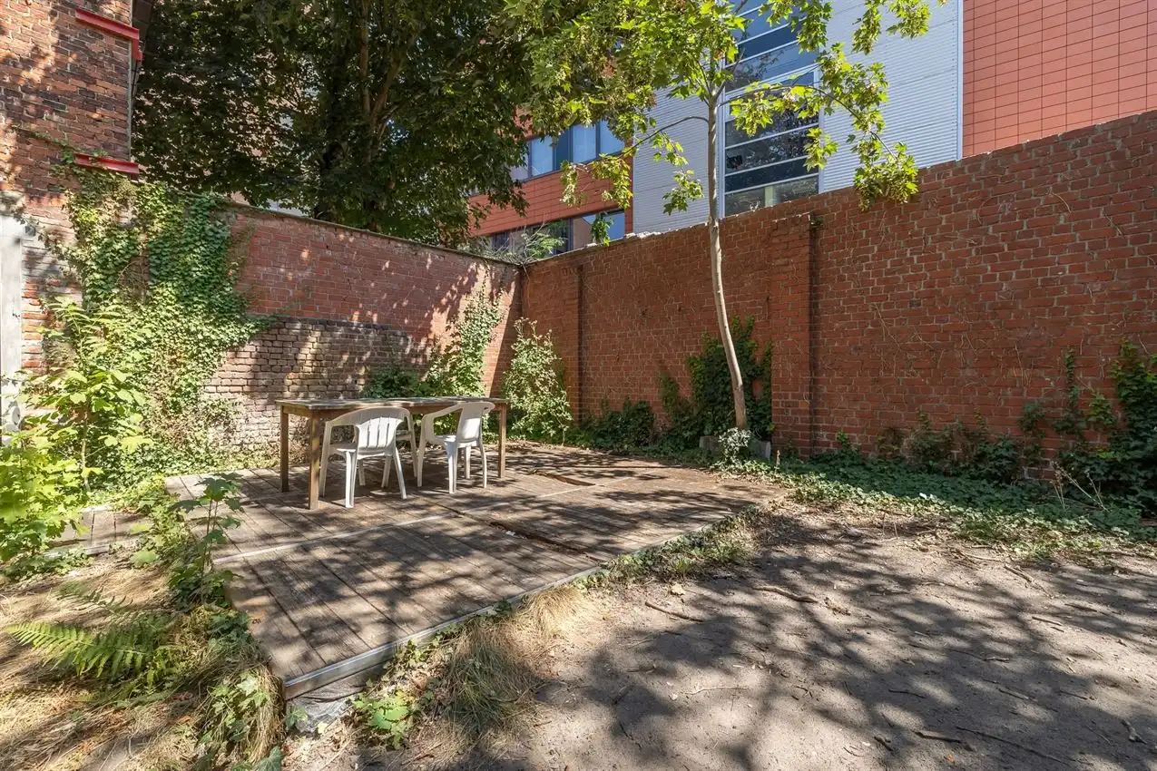 Ruim gelijkvloers appartement met zonnige tuin op toplocatie foto 3