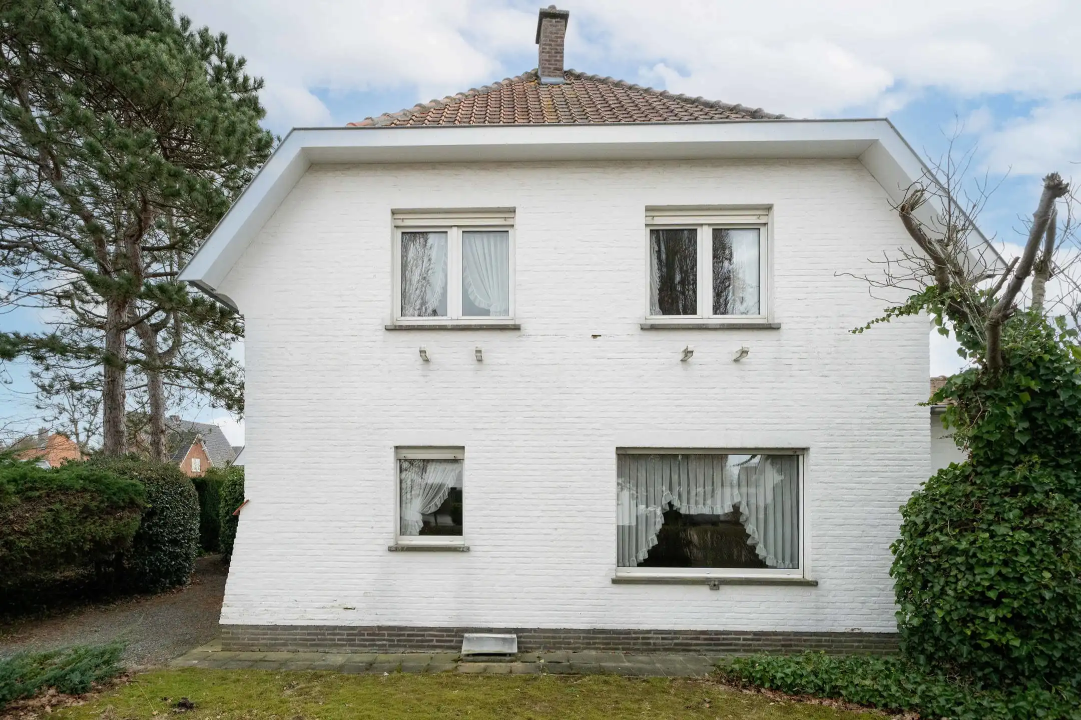 Woning op een ruim hoekperceel van 7a25ca in rustige woonwijk te Sint-Katelijne-Waver foto 3