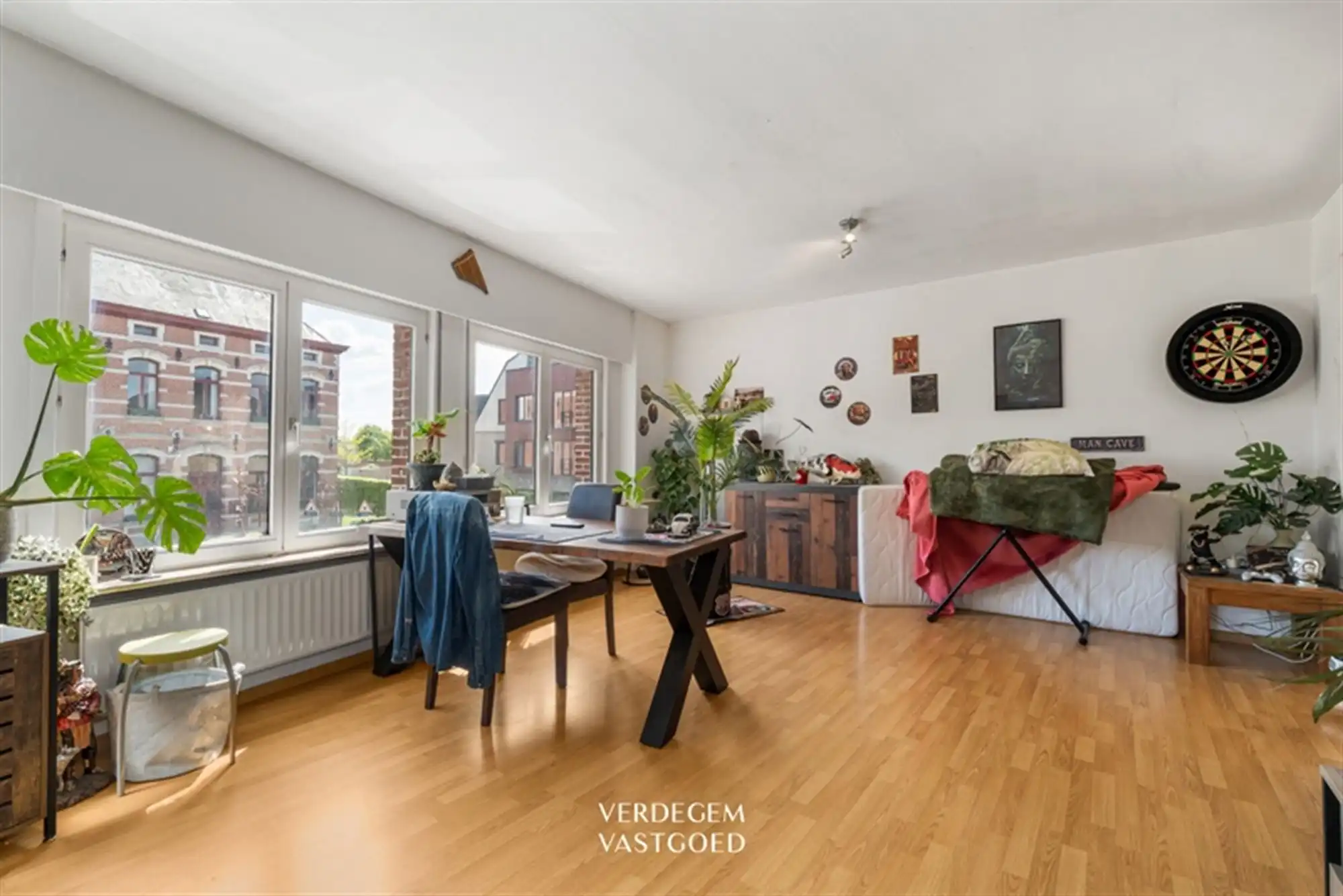 Opbrengsteigendom met 2 appartementen en 4 garages in het centrum van Sleidinge  foto 5