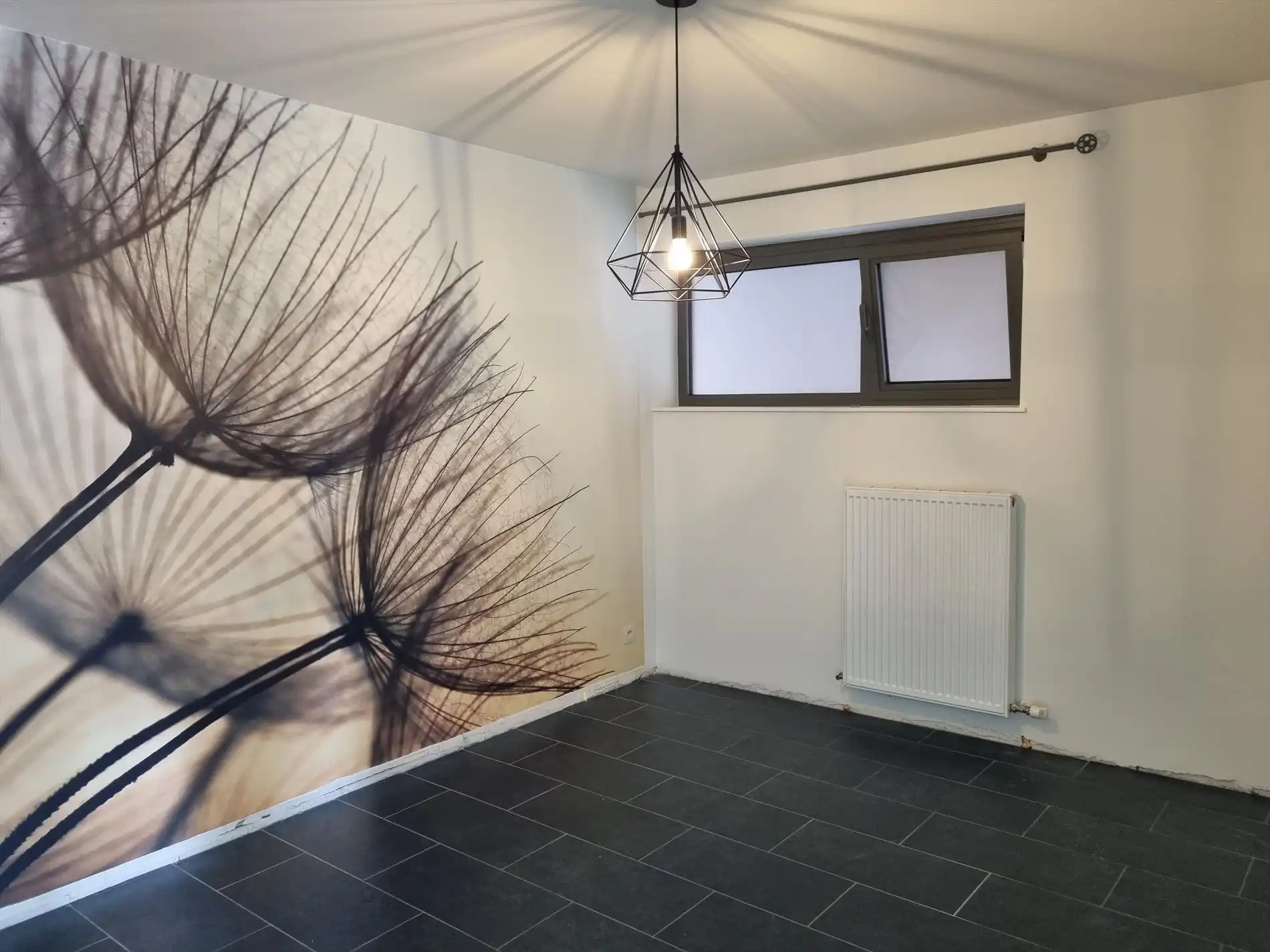 Knap gelijkvloers éénslaapkamerappartement met tuin en garagebox. foto 10