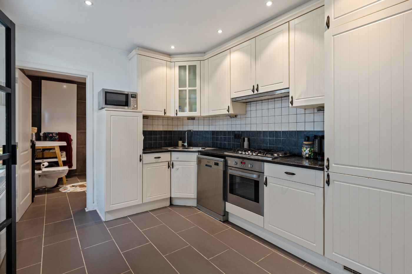 Toffe, instapklare woning met 3 slpk. en tuin foto 8