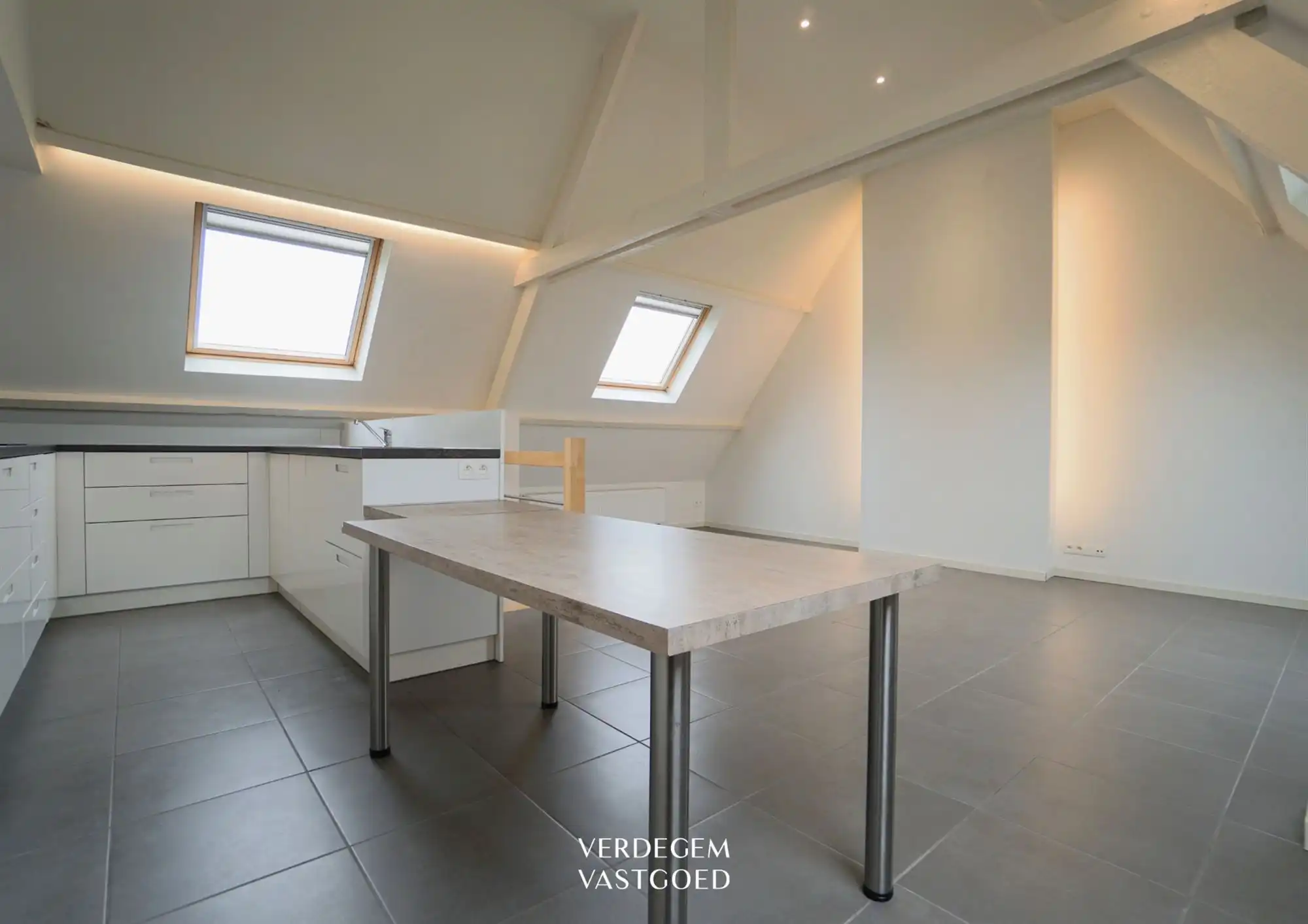 Instapklaar duplexappartement met karaktervolle leefruimte en 2 slaapkamers foto 5