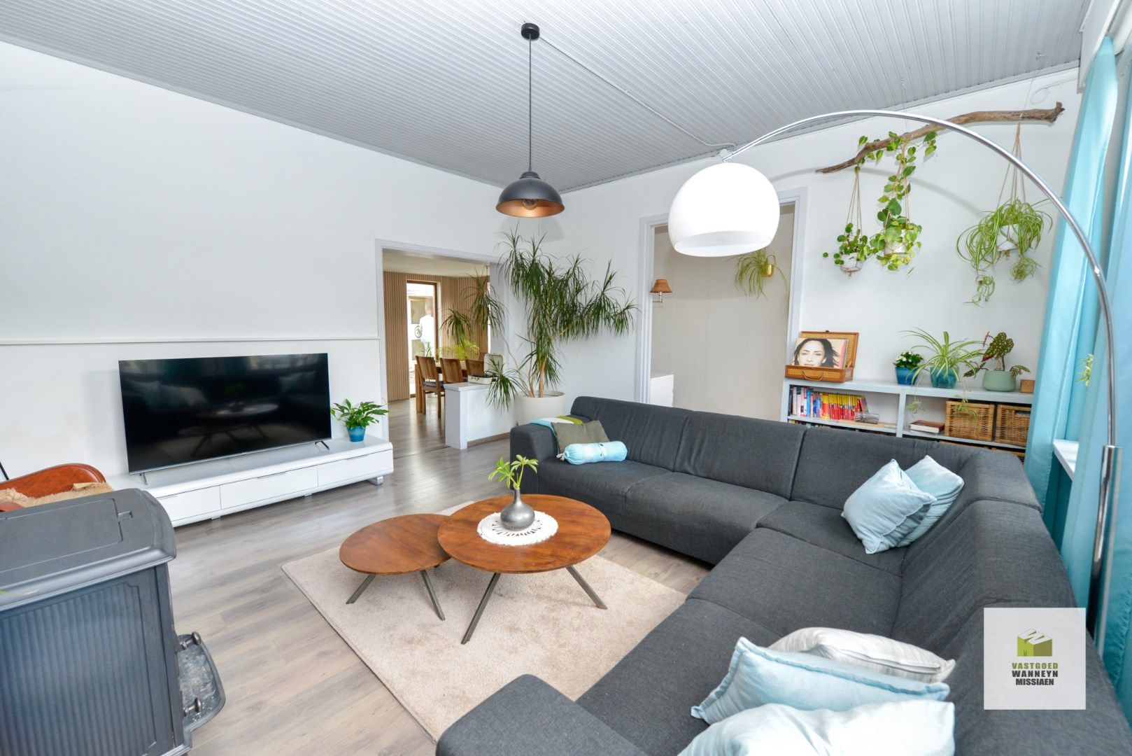 Halfopen bebouwing met 3slpk, 2 bijgebouwen en diepe tuin foto 4