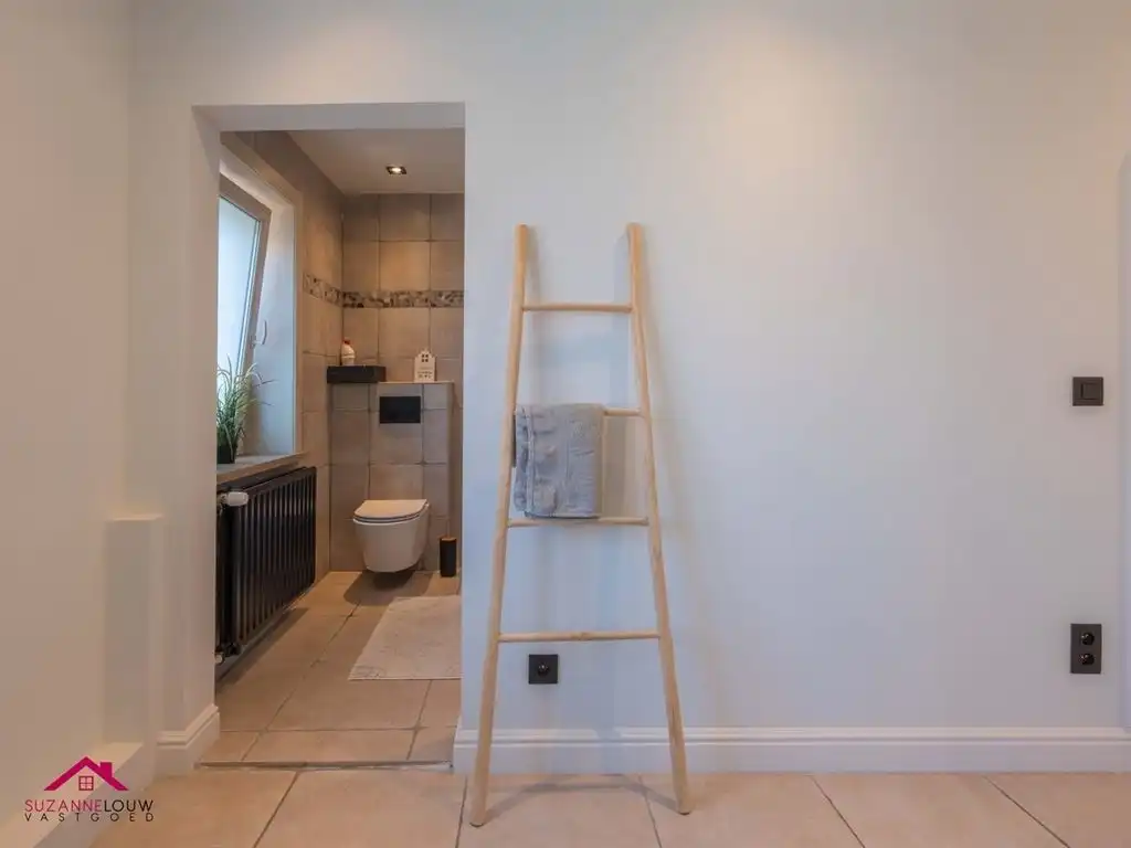 Instapklare woning met handelsruimte in gesloten bebouwing foto 33