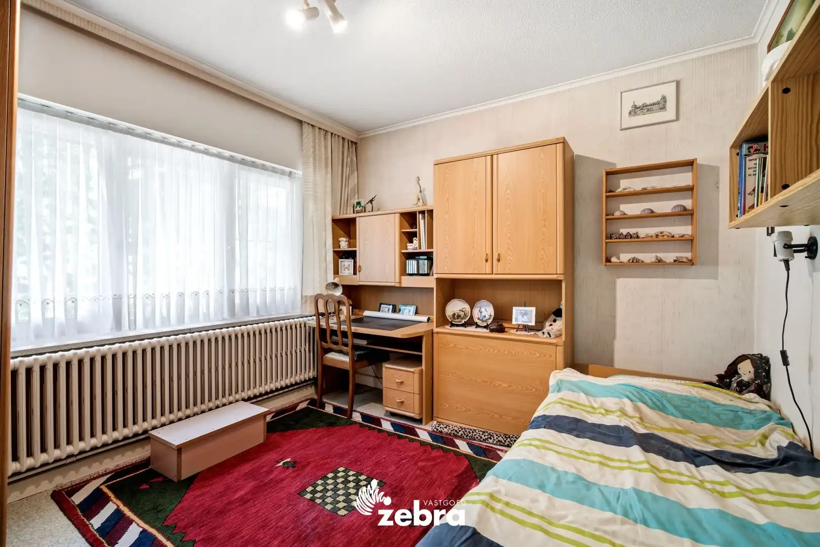 Ruime gezinswoning met 3 slaapkamers, ingerichte zolder, garage en tuin! foto 15