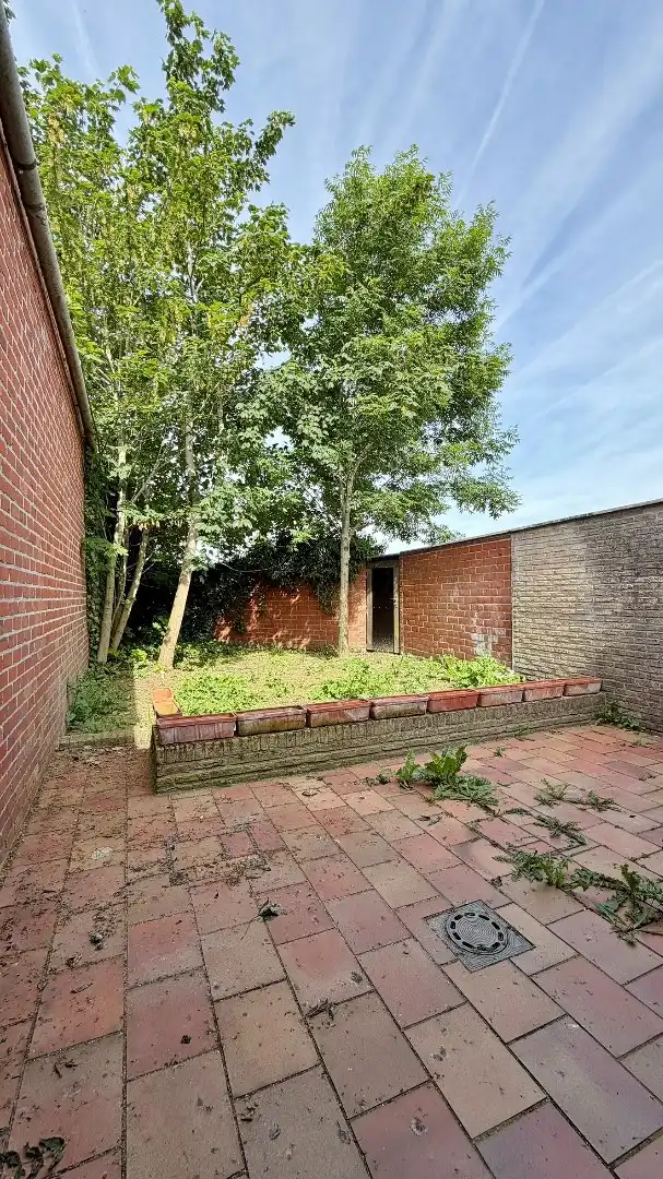 Charmante opgefriste woning met gezellige tuin en terras foto 11