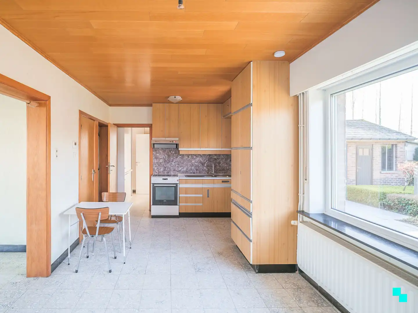 Te renoveren woning met garage en unieke tuingrond grenzend aan het bos foto 5