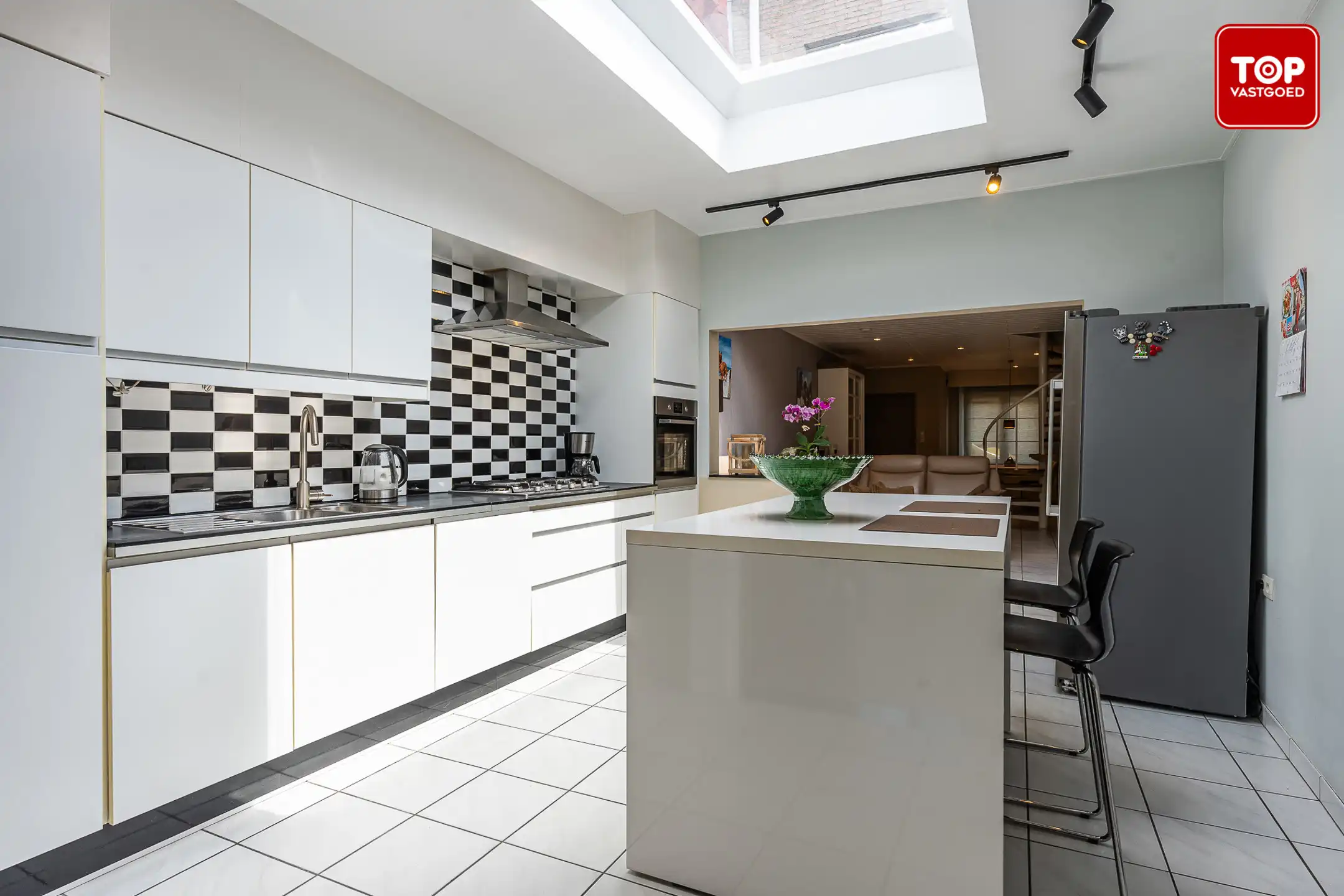 Instapklare woning met mooi aangelegde tuin.  foto 7