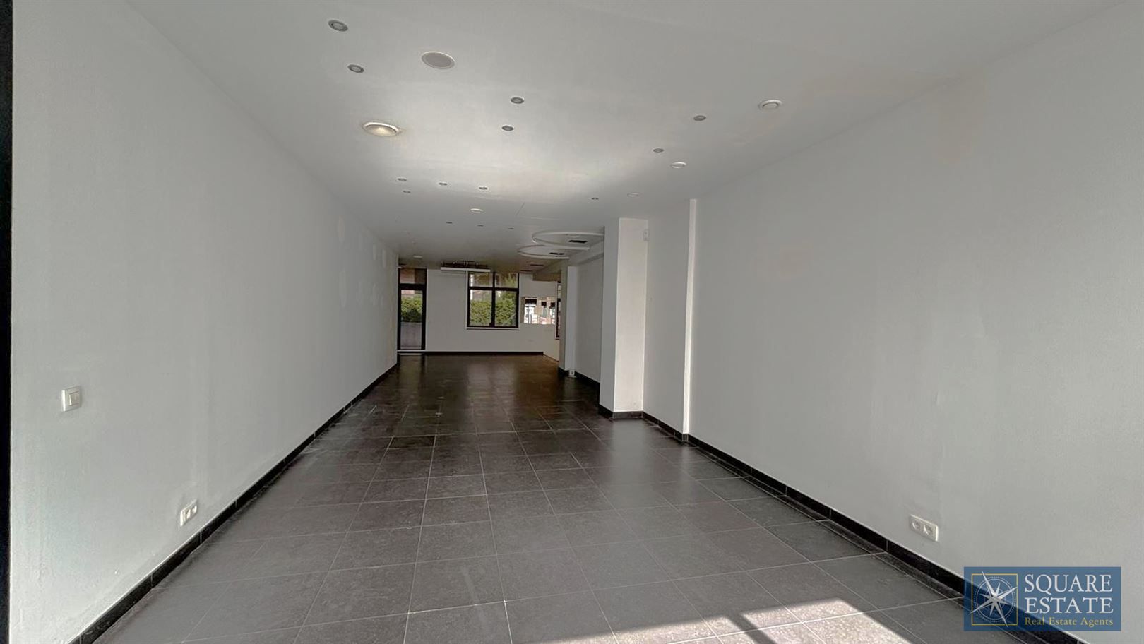 Winkelruimte op de Markt van Wemmel foto 6