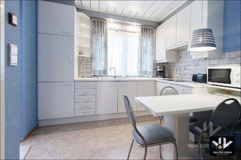 Charmante en verzorgde rijwoning met gezellig stadstuintje en 2 parkeerplaatsen in hartje Runkst foto 12