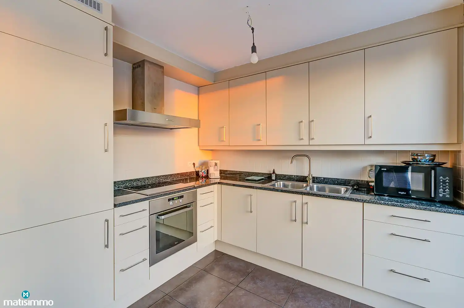 DUPLEXAPPARTEMENT MET 2 SLAAPKAMERS, 1 CARPORT, 1 AUTOSTAANPLAATS, TERRAS, AIRCO EN ZONNEPANELEN TE GROTE-SPOUWEN foto 7