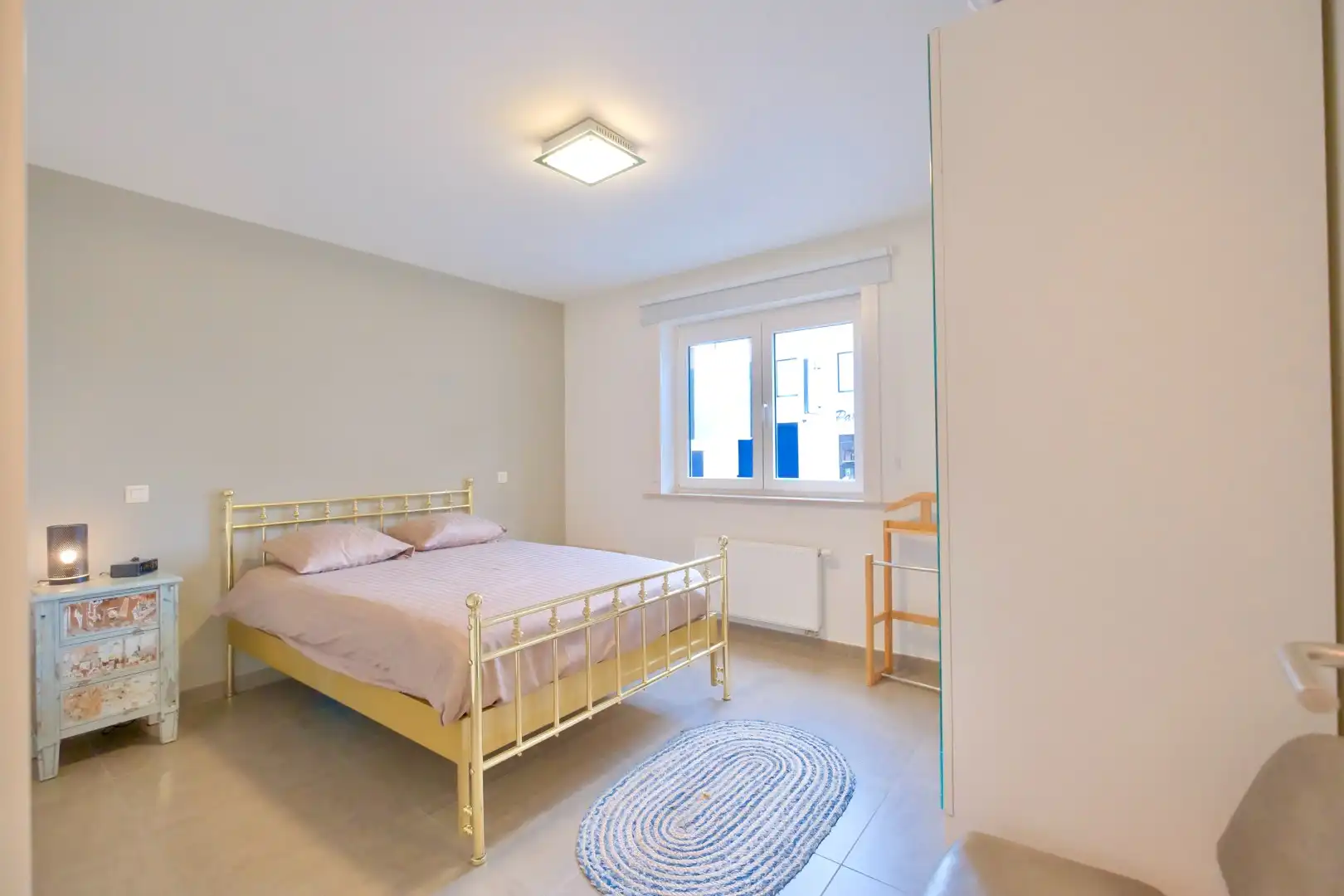 Gelijkvloers app met 2 slaapkamers, ruim terras en garage! foto 12