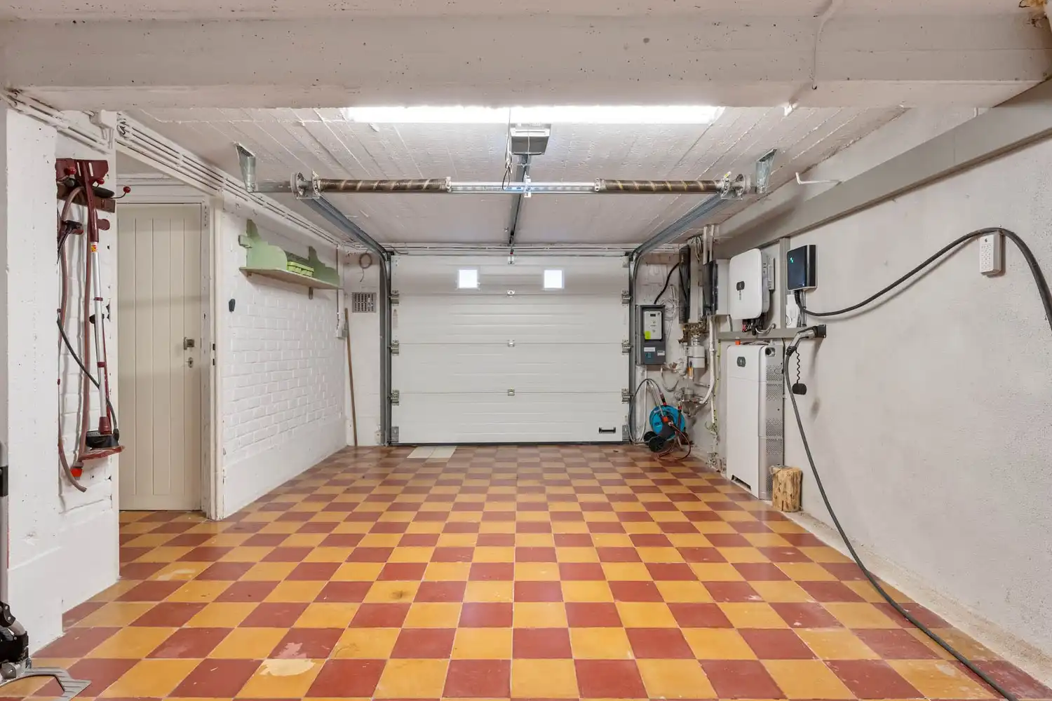 Gerenoveerde en energiezuinige(B-label) woning met 3 slaapkamers, 2 badkamers, een dressing, een garage met een oprit en een tuin nabij het station van Leuven! foto 30