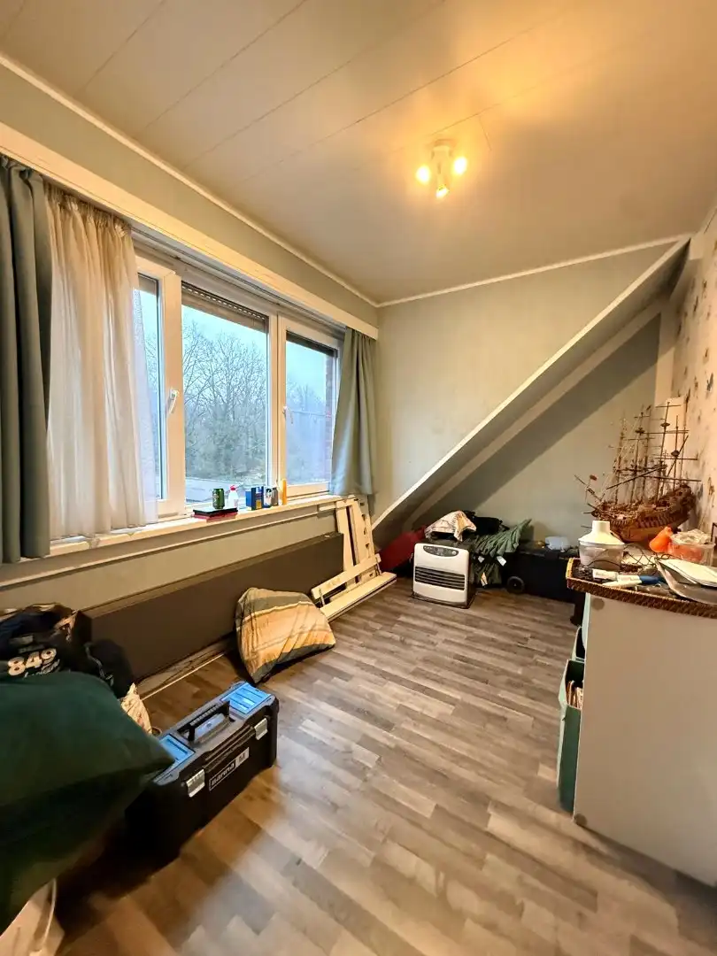 Op te frissen energievriendelijke woning met 4 slaapkamers en garage  foto 16