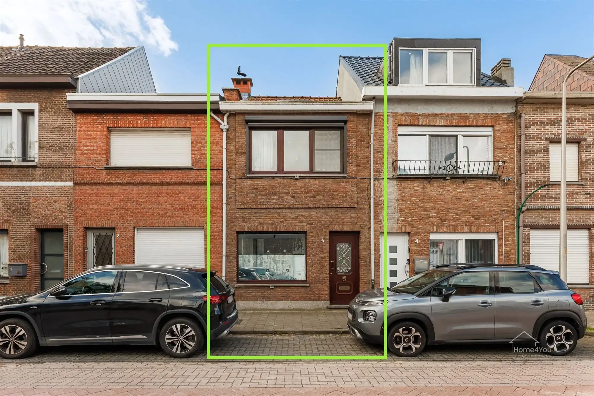 Instapklaar rijhuis met 2 slpk, vernieuwde keuken & badkamer foto 16