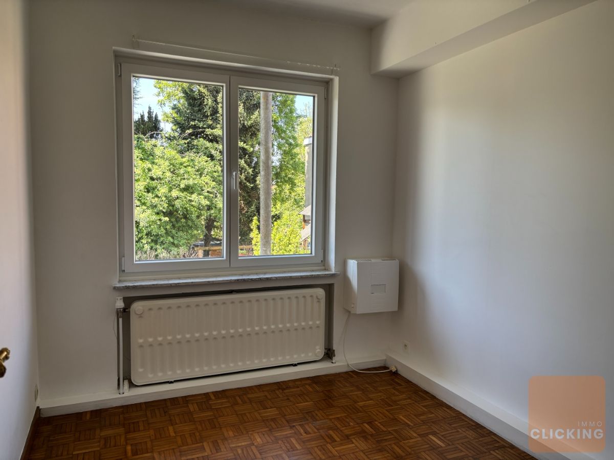 Tof 2 slaapkamer appartement met 2 parkeerplaatsen en ruime tuin foto 8