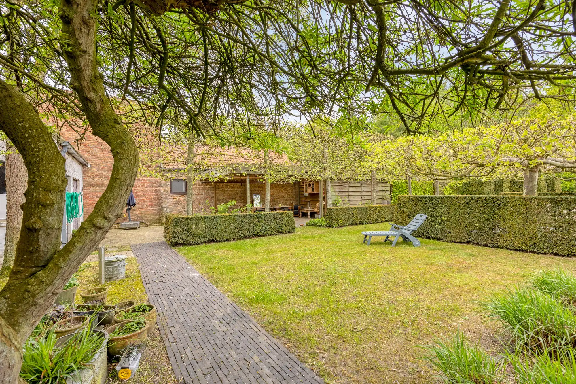 Karaktervolle villa met polyvalent bijgebouw, zwemvijver & aangelegde tuin met uitweg op 4.012m² foto 10