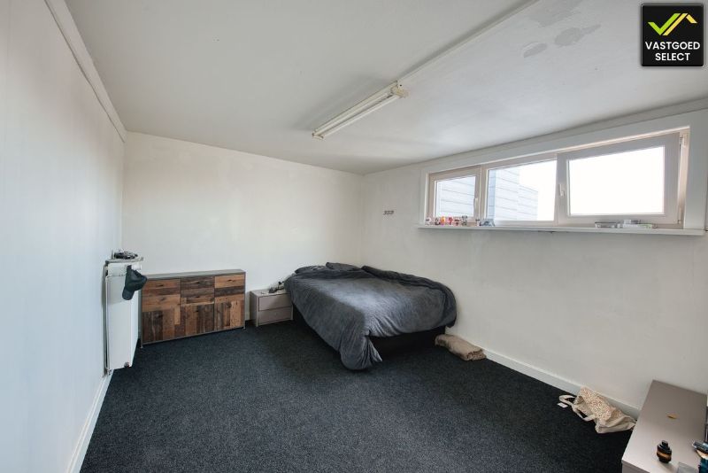 Statige herenwoning met bijgebouw, garage­mogelijkheden en patio in centrum Eeklo foto 14