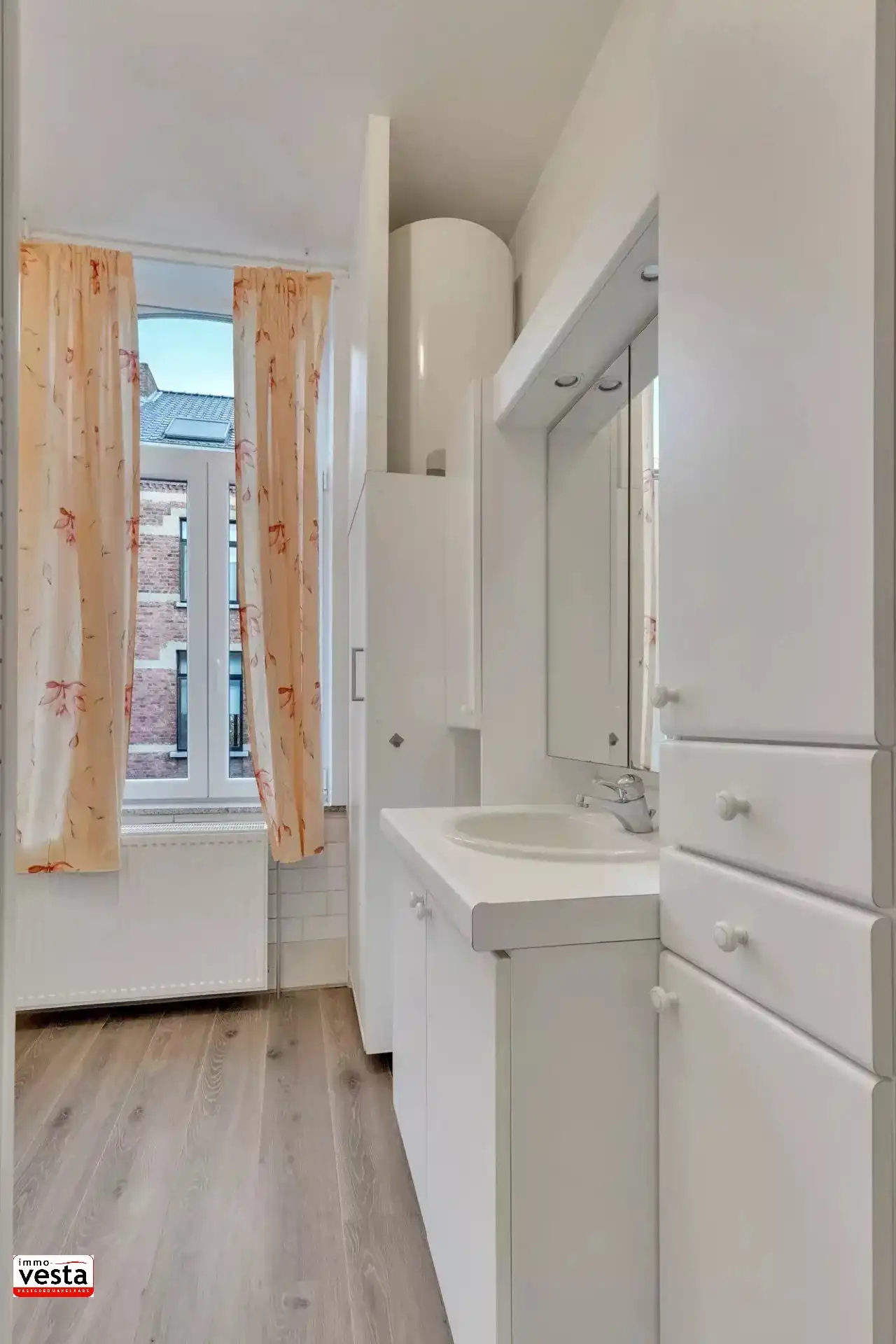 Goed gelegen, energetisch gerenoveerde stadwoning foto 16