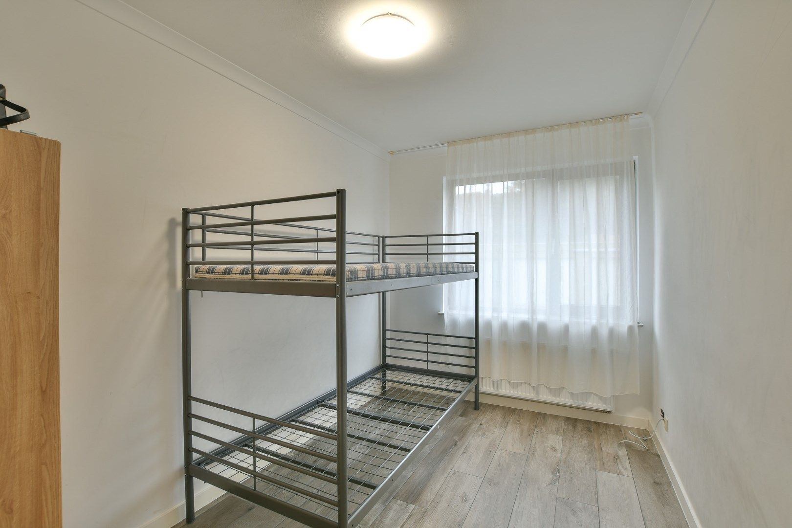 Gelijkvloers 2-slaapkamerappartement foto 9