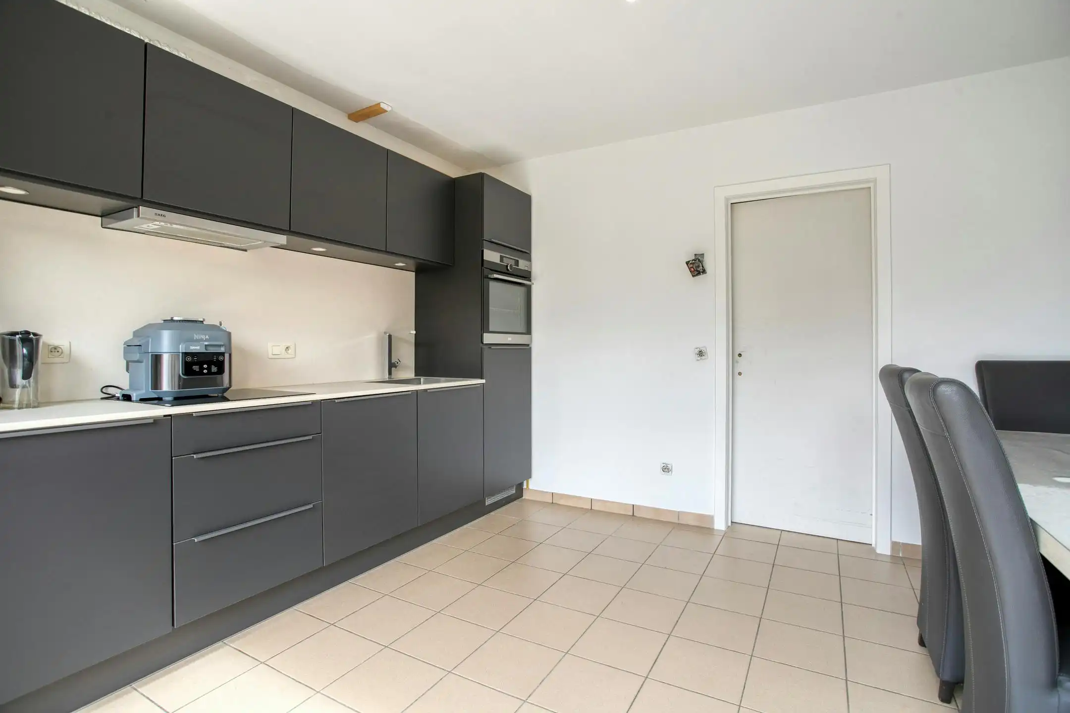 Charmante gezinswoning met 3 slaapkamers en garage in Heule! foto 2