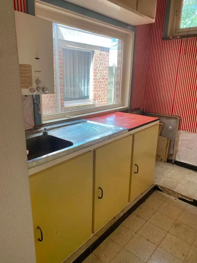 Centraal gelegen woning met tuin en ruime inrichtbare zolder foto 4