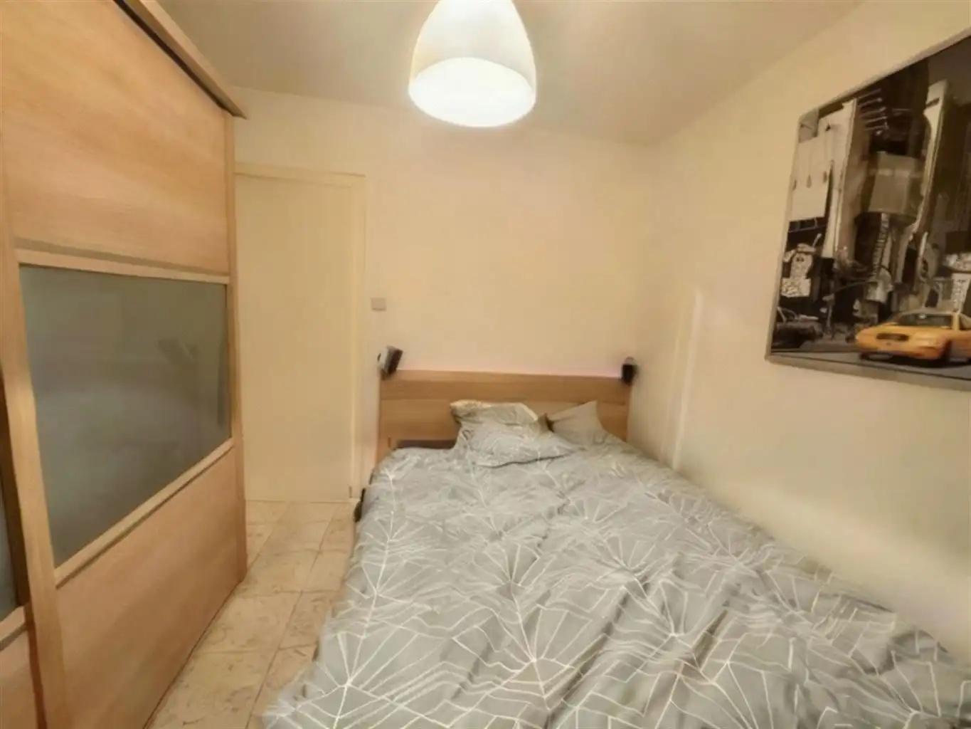 Ruim gelijkvloers appartement met 2 slaapkamers, tuin en garagebox. foto 6