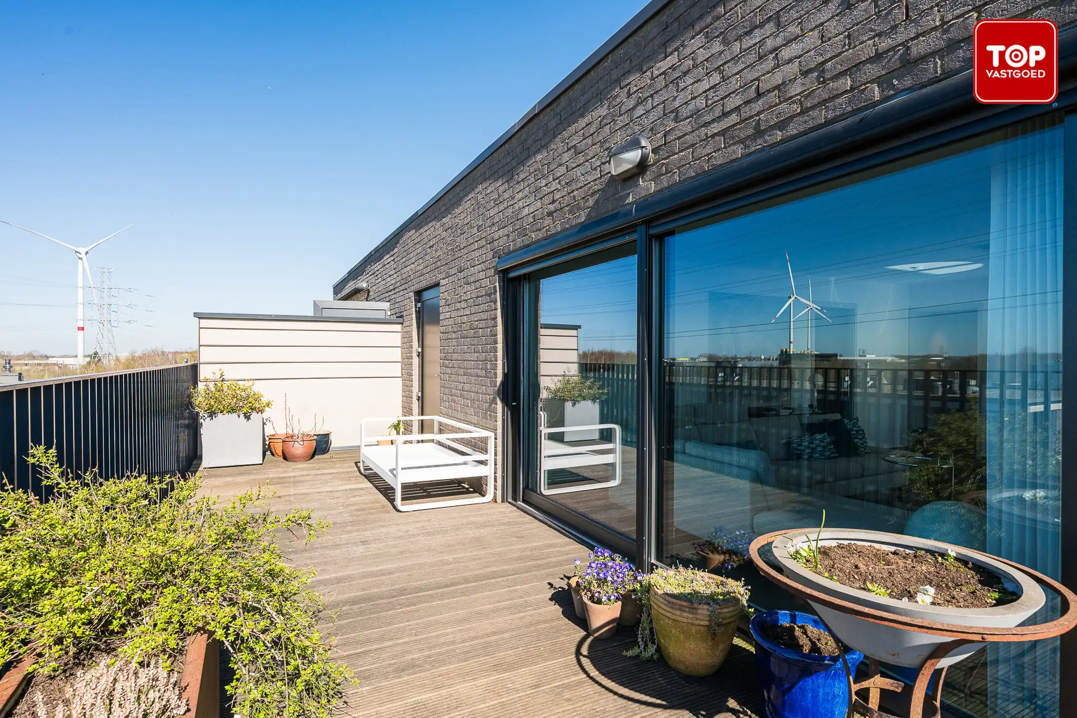 Hoogwaardig afgewerkte penthouse met 45m² terras. 2 slaapkamers, garage en staanplaats!  foto 10