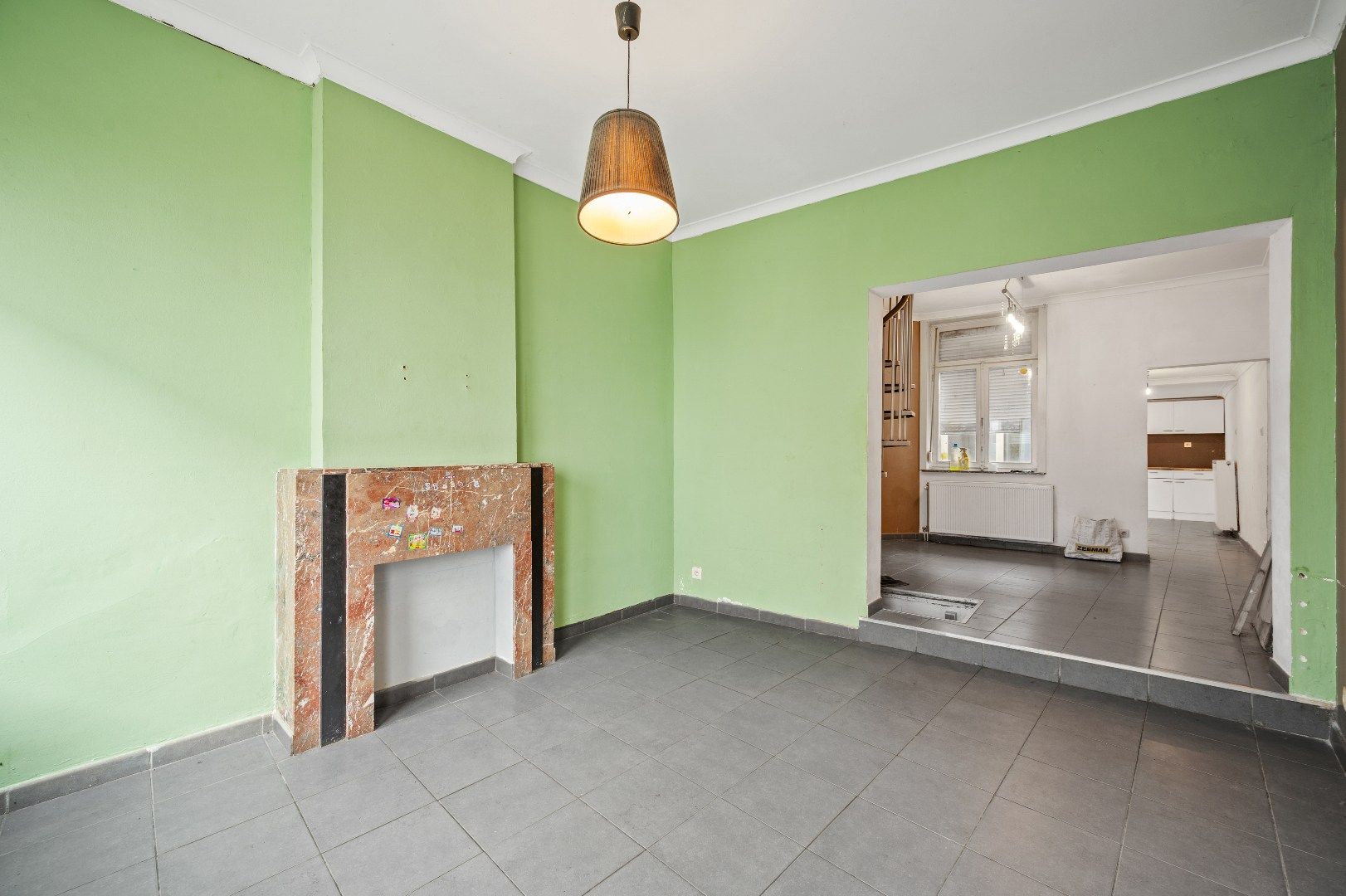 Centraal gelegen, te renoveren rijwoning nabij station foto 5