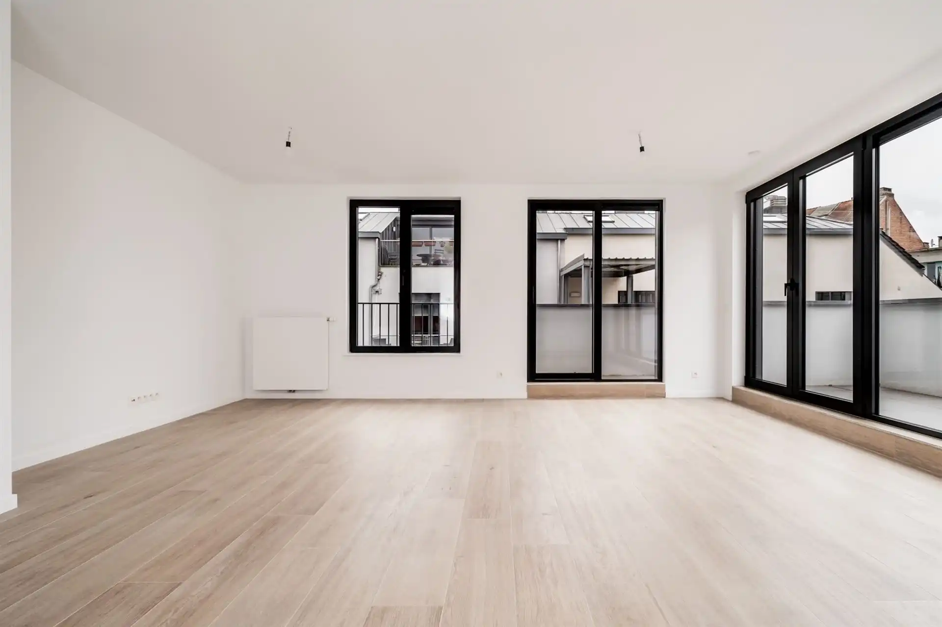 Dicht bij het Tour&Taxis-terrein, prachtig duplex penthouse met 3 slaapkamers foto 5