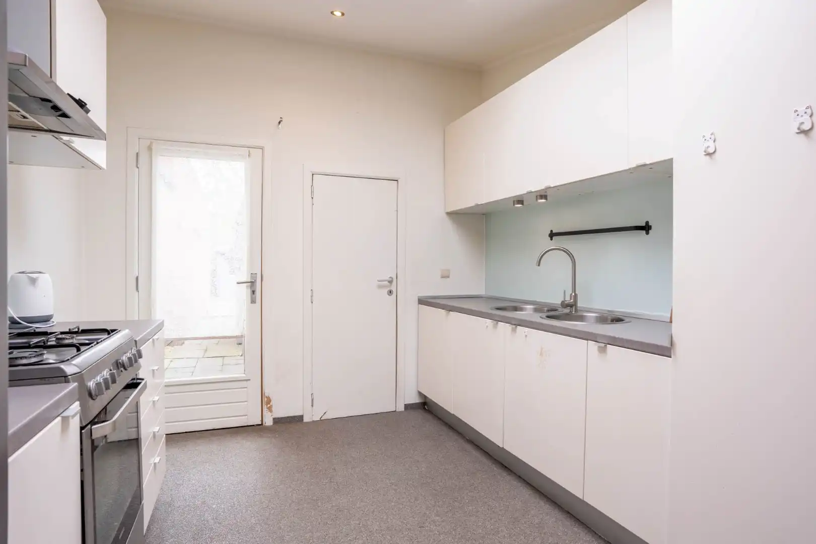 Een knusse rijwoning met tuintje en 3 slaapkamers, gelegen pal in het centrum van Maaseik. foto 11