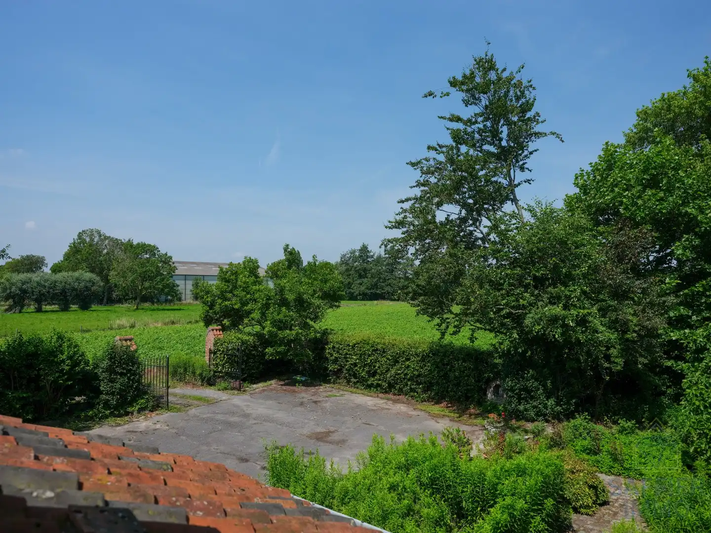 Uniek pand op 3.515 m² met prachtige tuin en volop privacy in Ingelmunster foto 10