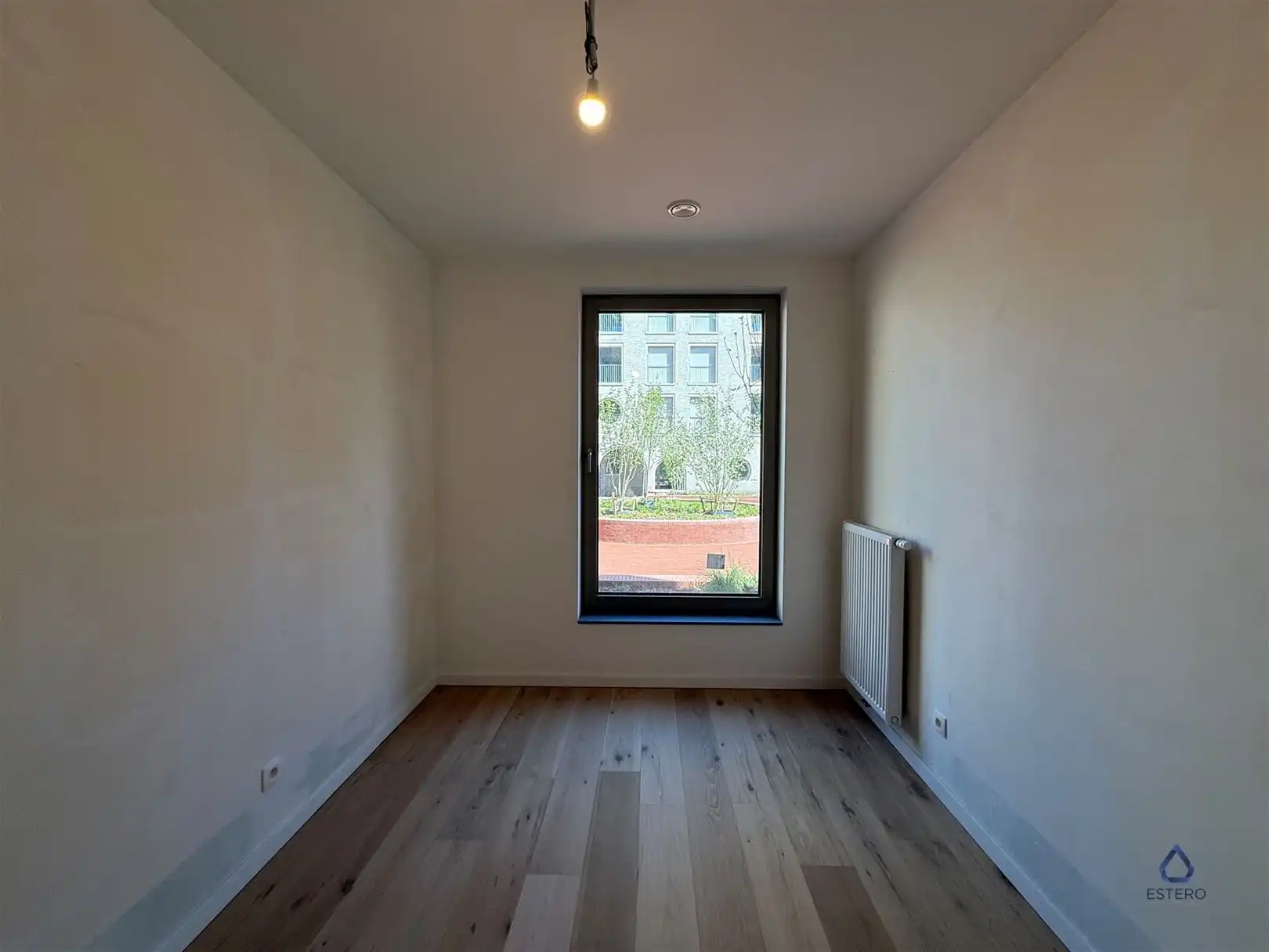 Modern nieuwbouwappt 2-SLK met terras te Tour & Taxis foto 16