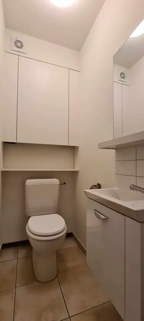 Charmant 2 slpk-appartement met autostaanplaats in residentiële buurt foto 15