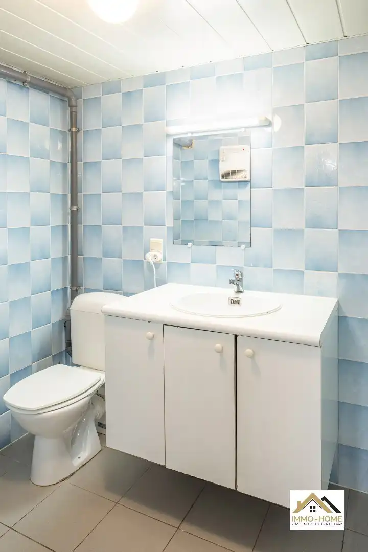 Zeer ruim gelijkvloers appartement met woonkelder en private tuin  foto 23