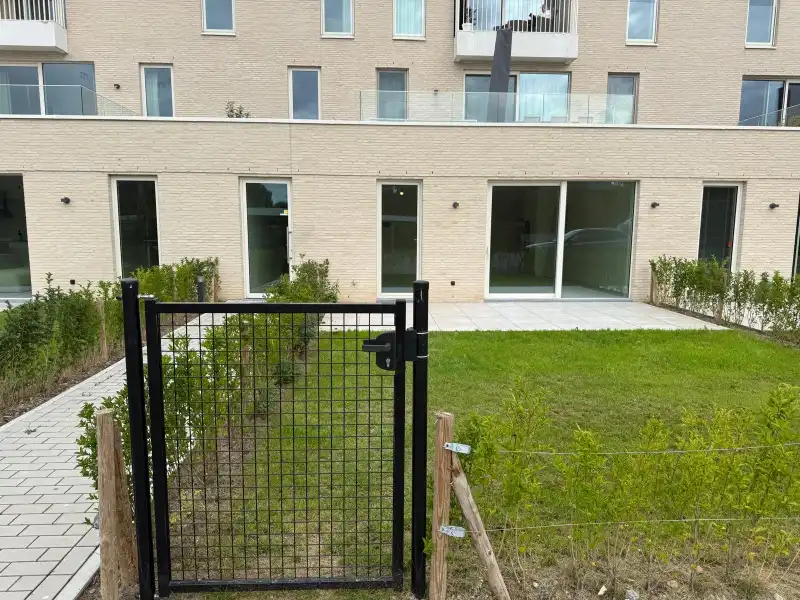Energiezuinig 2 slpkm appartement met terras, tuin en staanplaats foto 16