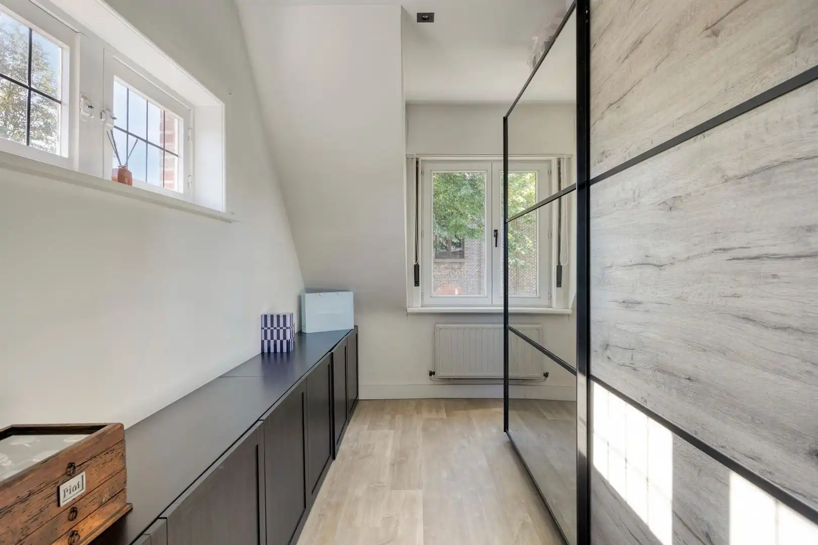 instapklare, hedendaags en stijlvol ingerichte woning met heerlijke tuin en garagebox foto 16