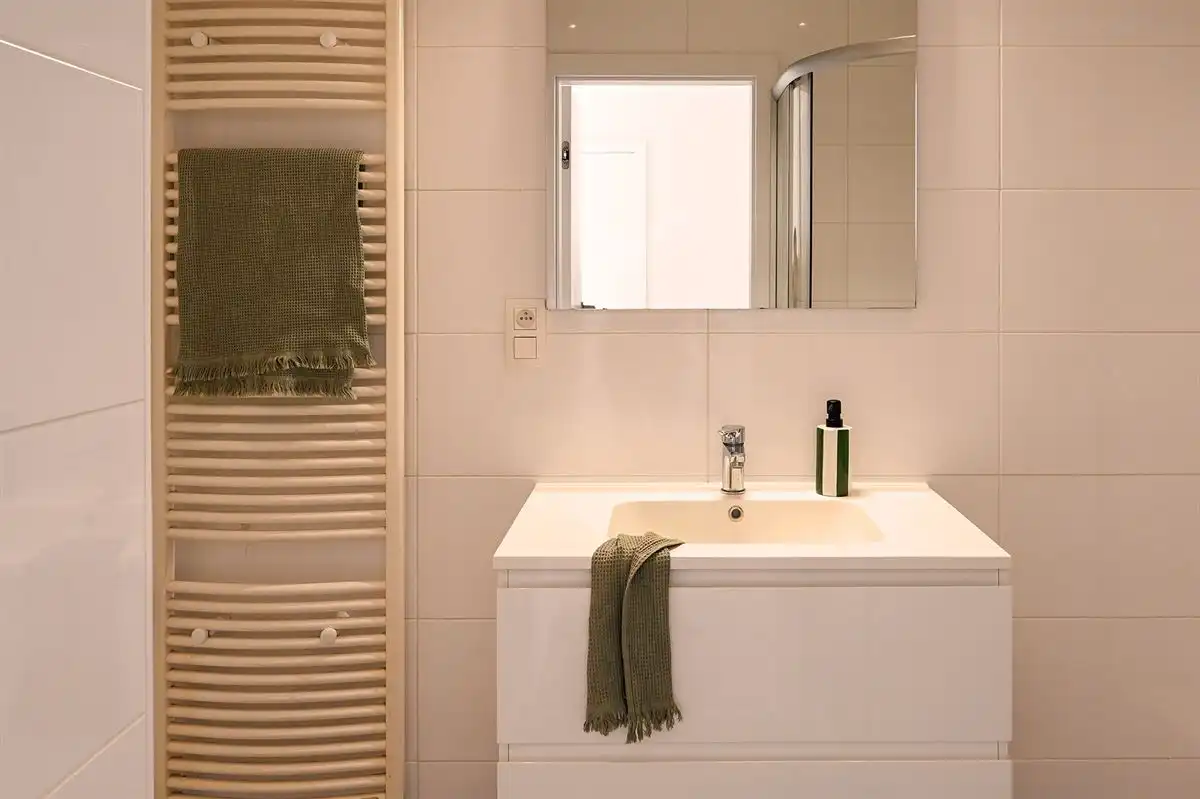 Lichtrijk hoekappartement in hartje Brasschaat foto 18
