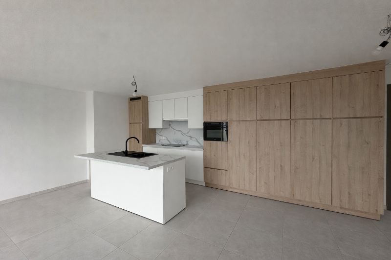 Gelijkvloers appartement met terras en tuin. foto 5