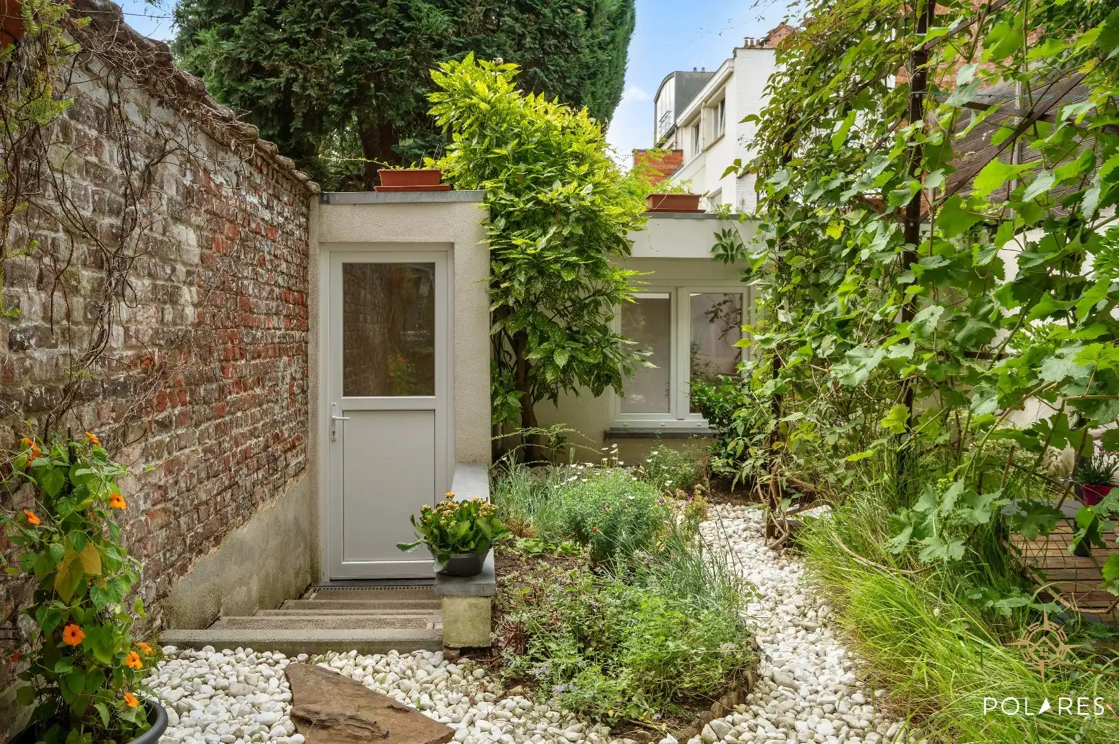 Gelijkvloers appartement met tuin, garage én bijgebouw! foto 17