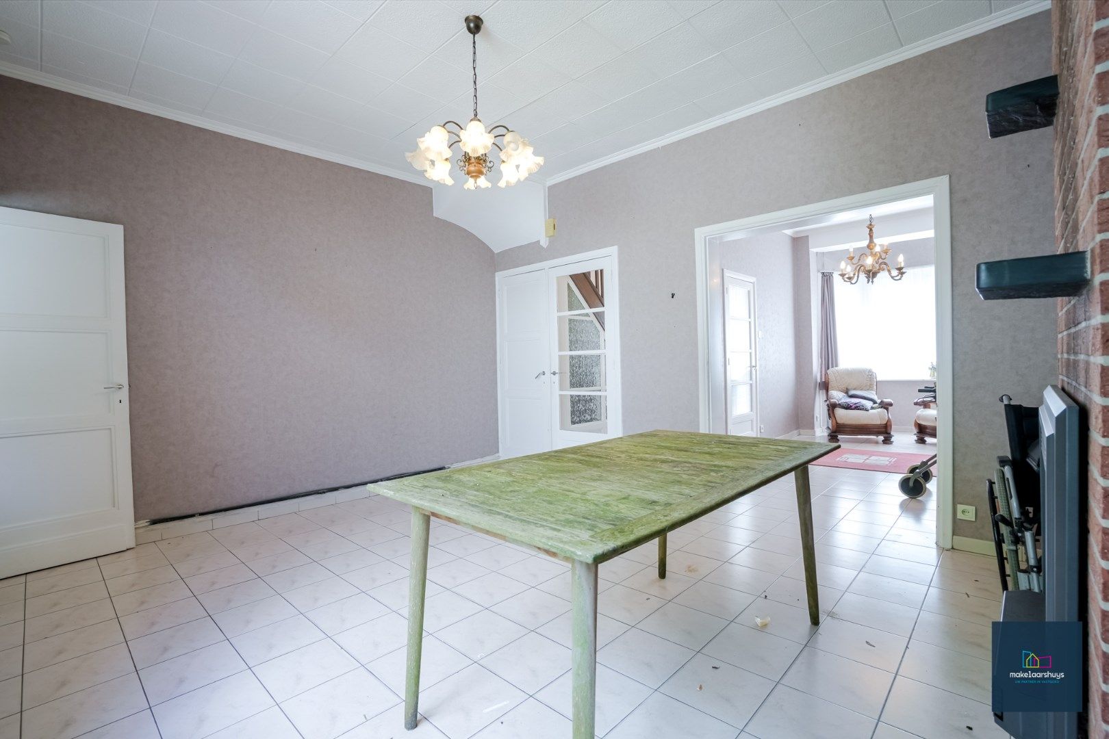 Centraal gelegen te renoveren woning in rij met tuin te Mariakerke foto 4