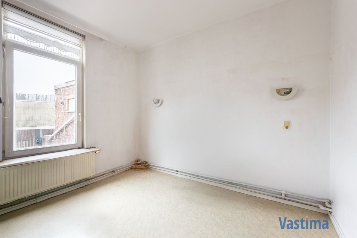 Twee aanpalende woningen met loods nabij centrum Aalst – ideaal voor wonen, werken of project foto 32