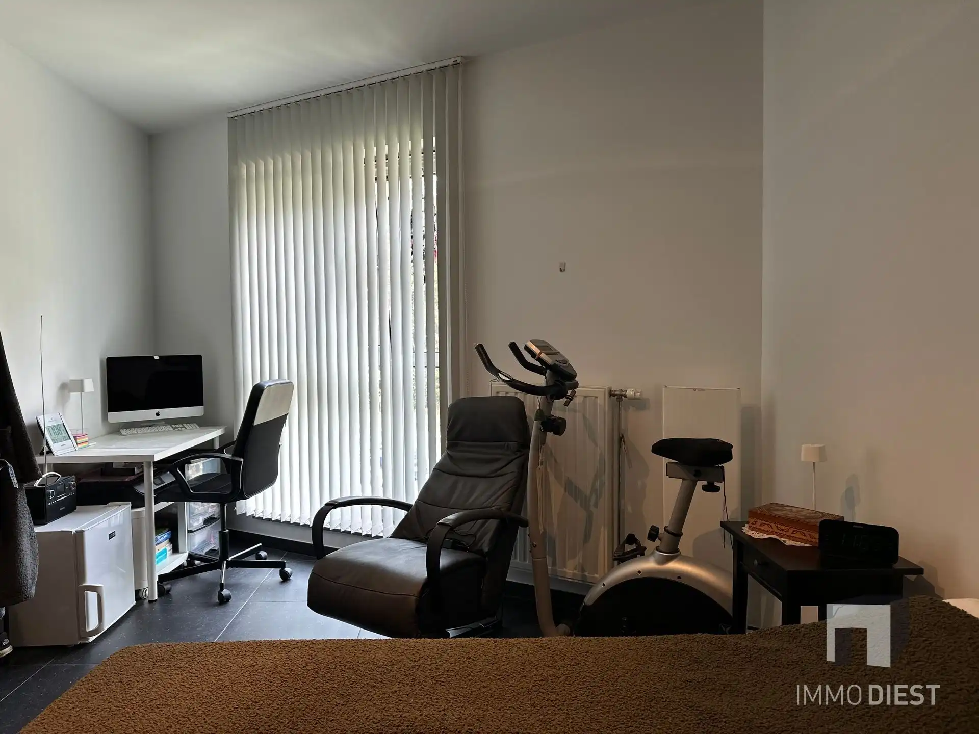 Instapklaar appartement met 2 slpks, terras, parking en kelder foto 11
