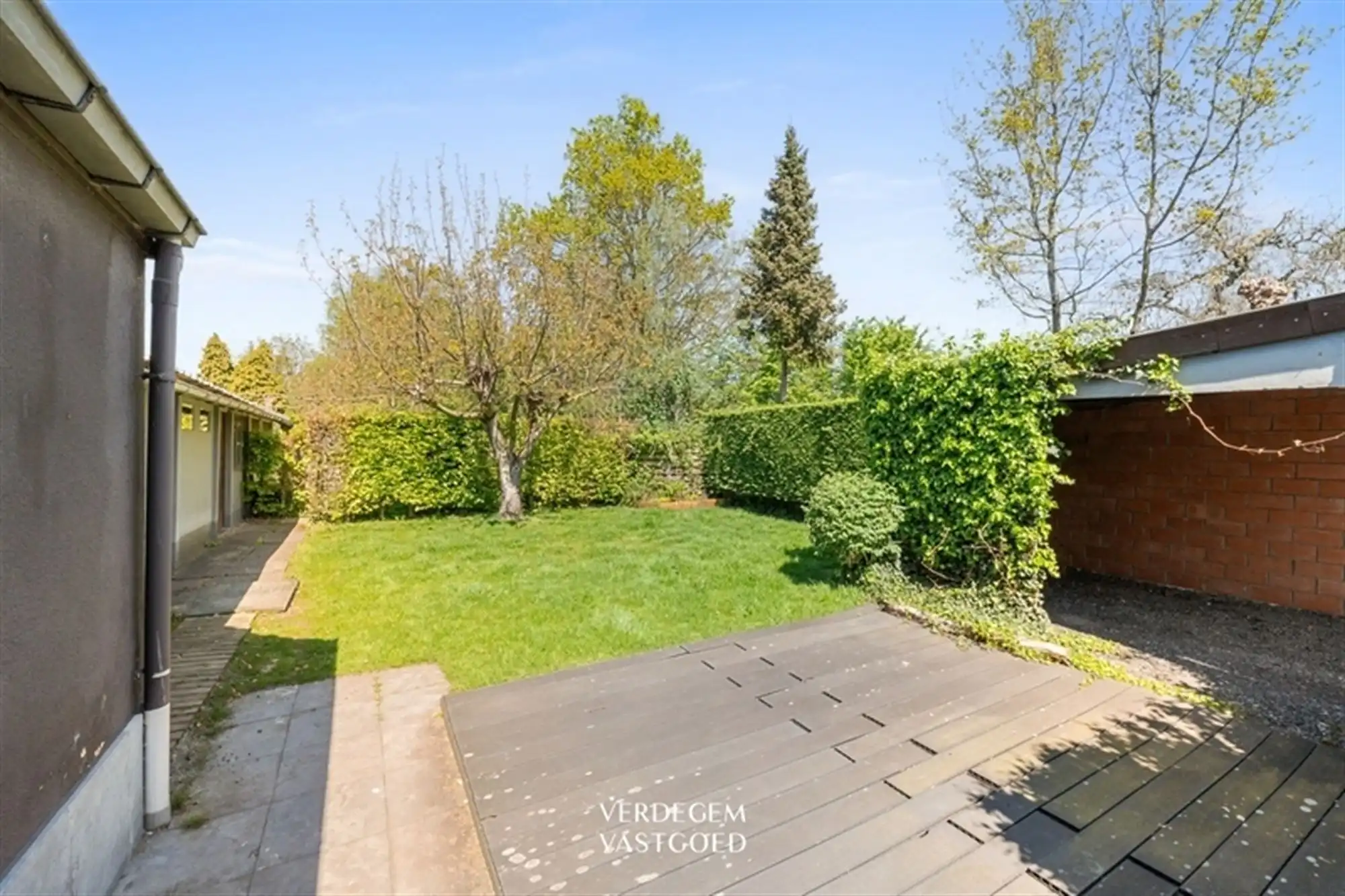 Charmante woning met 2 slaapkamers en fijne tuin met volledige privacy foto 14